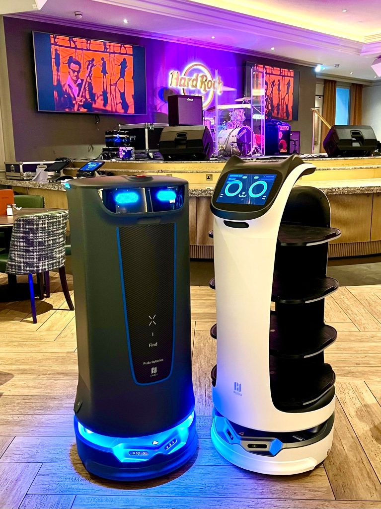 Holabot and Bellabot lined up in front of the bar in Hard Rock Hotel