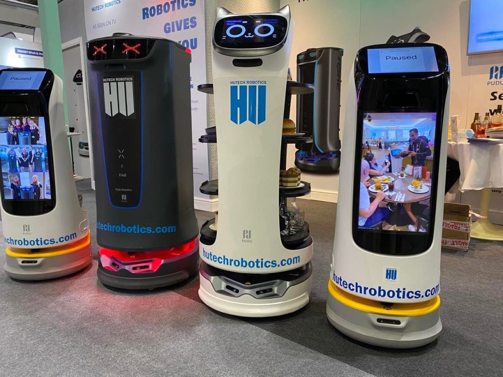 Four Hutec Robots lined up, left to right, Puductor2, Holabot, Bellabot and Kettybot